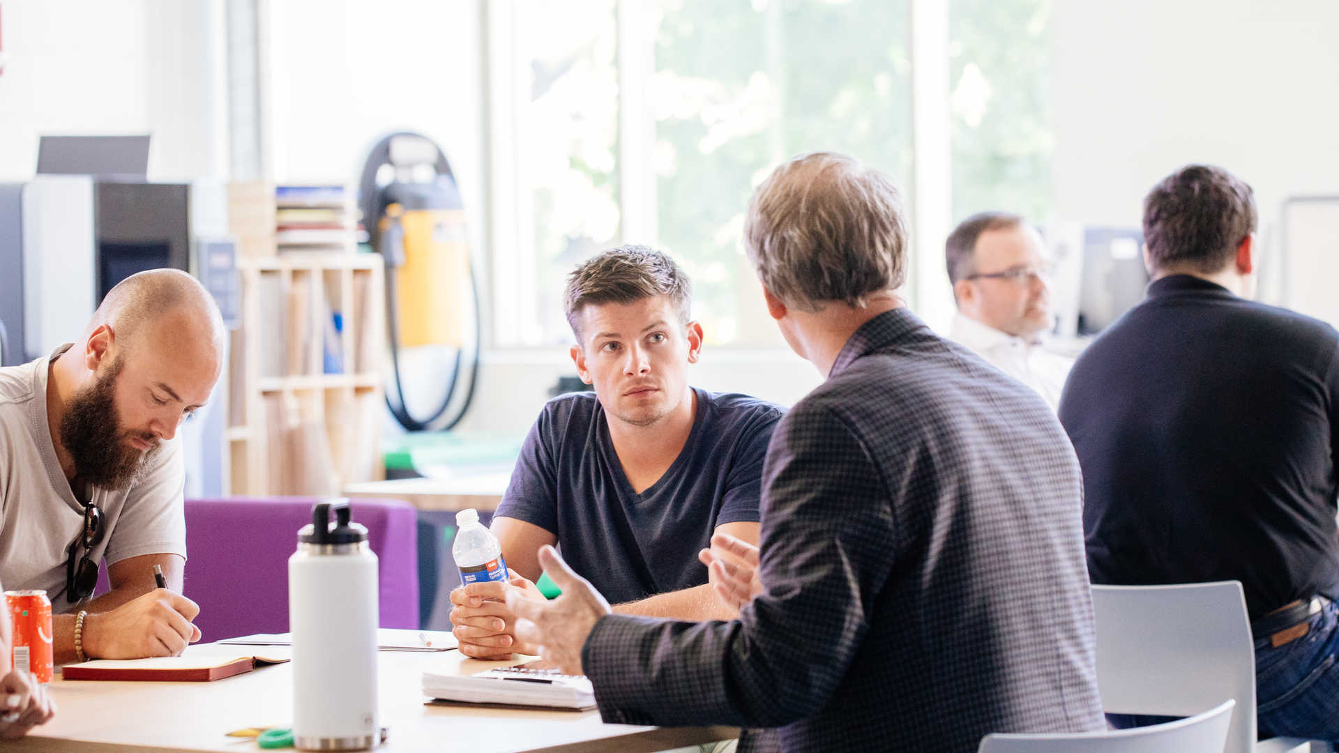 Mentors meet with entrepreneurs