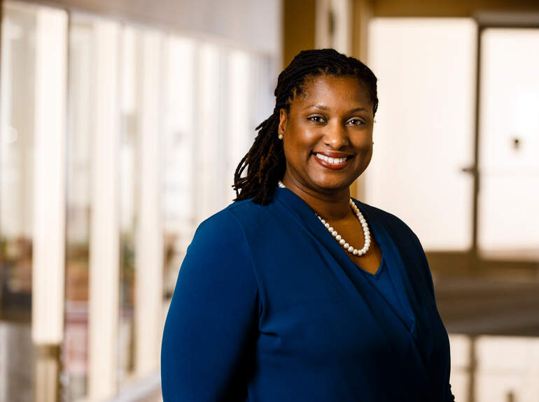 Associate Dean in the Opus College of Business  Janine Sanders Jones